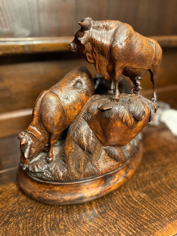 Pair of Black Forest Sculptures of Cattle Attributed to Johann Huggler of Brienz