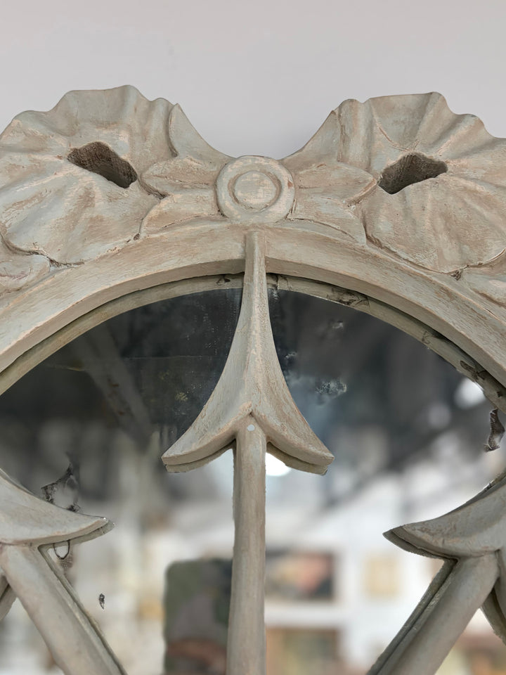 Pair of Oval White Carved Resin Wall Mirrors with Bow & Arrow Motif