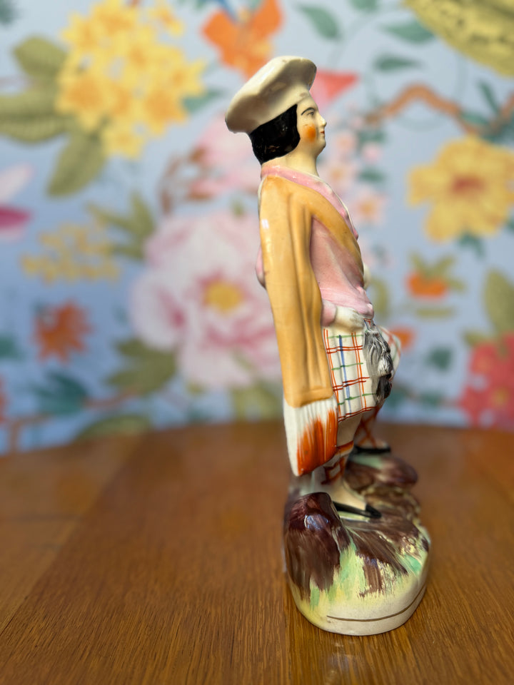 Antique Staffordshire Man in Skirt