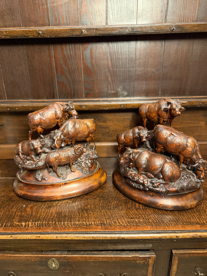 Pair of Black Forest Sculptures of Cattle Attributed to Johann Huggler of Brienz
