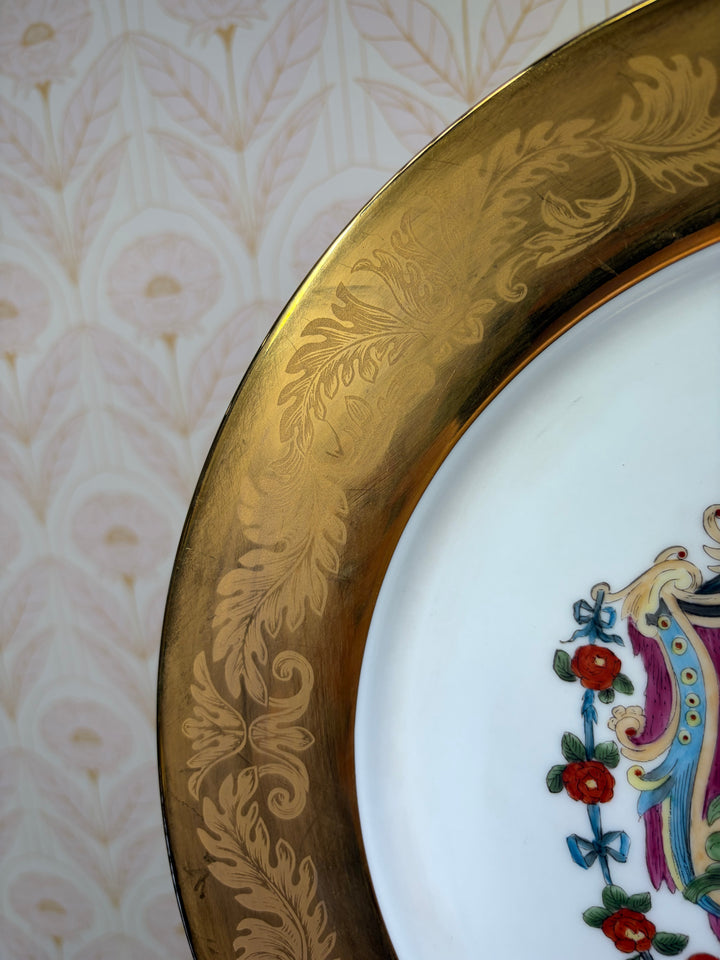 Pair of Decorative Armorial Porcelain Plates with Heavy Gold Borders