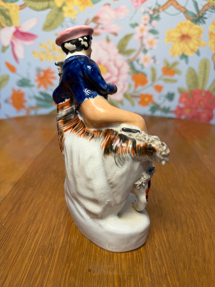 Antique Staffordshire boy on horse