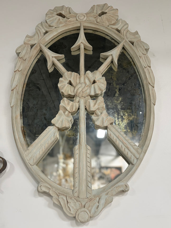 Pair of Oval White Carved Resin Wall Mirrors with Bow & Arrow Motif