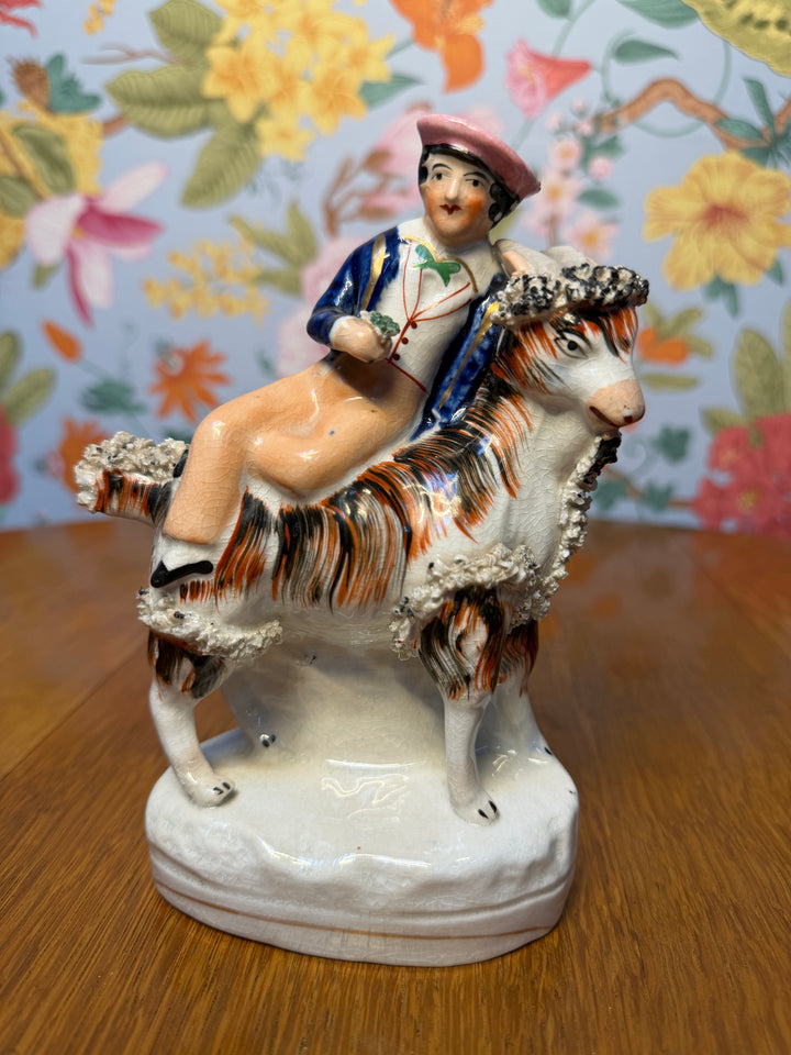 Antique Staffordshire boy on horse