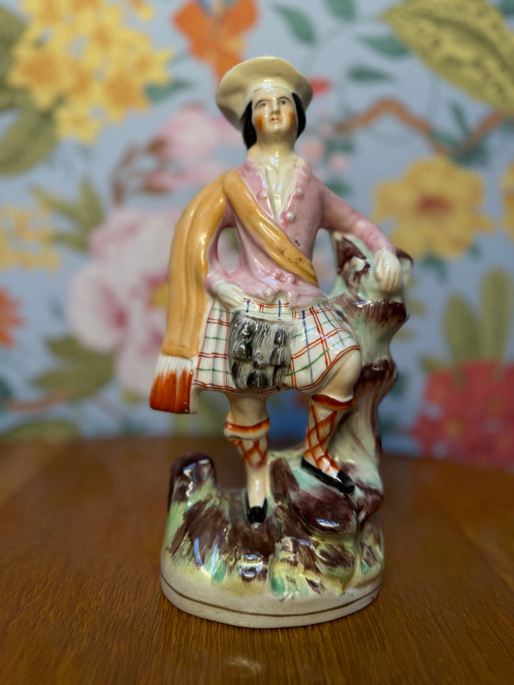 Antique Staffordshire Man in Skirt