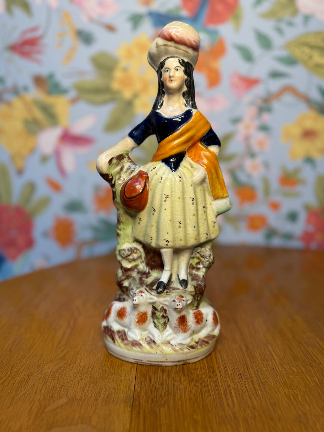Woman and Two Orange Lambs