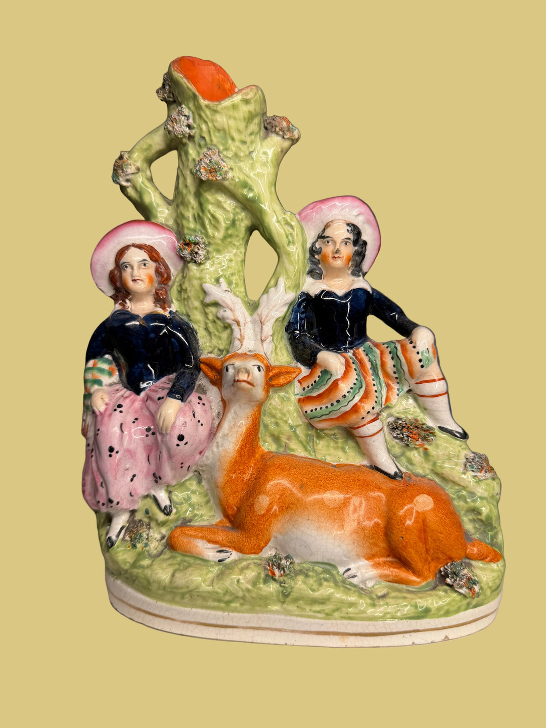 Staffordshire Pottery Figural Group with Two Children and Recumbent Deer