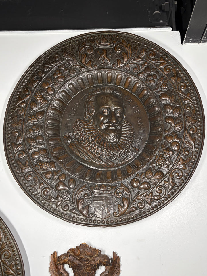 Pair of Large Bronze Relief Chargers with Portrait Bust and Heraldic Decoration