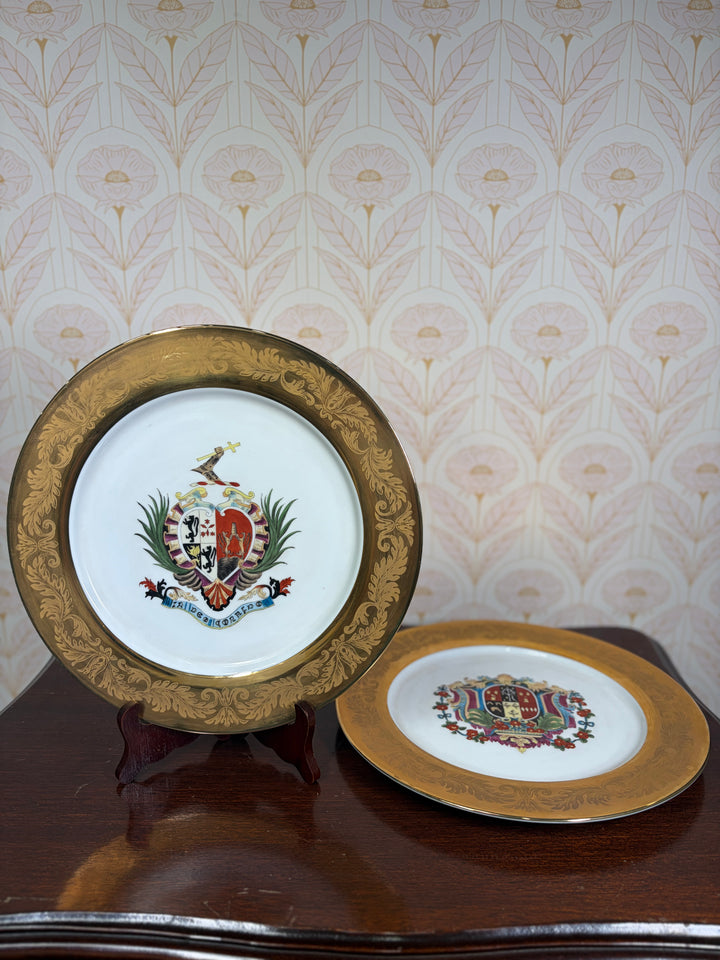 Pair of Decorative Armorial Porcelain Plates with Heavy Gold Borders