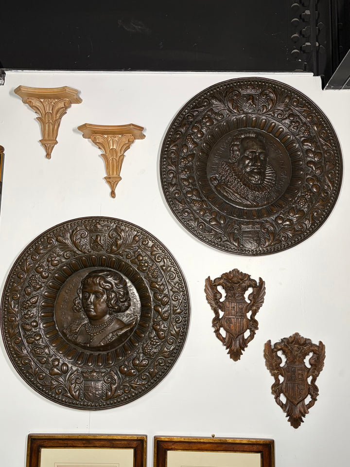 Pair of Large Bronze Relief Chargers with Portrait Bust and Heraldic Decoration