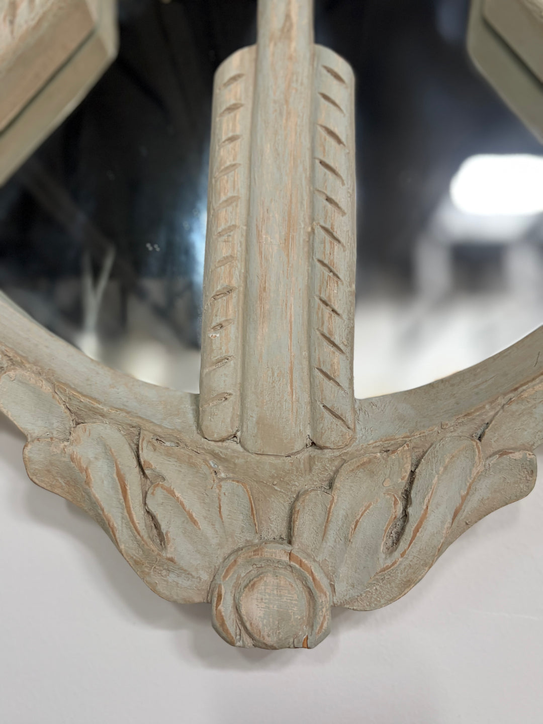 Pair of Oval White Carved Resin Wall Mirrors with Bow & Arrow Motif