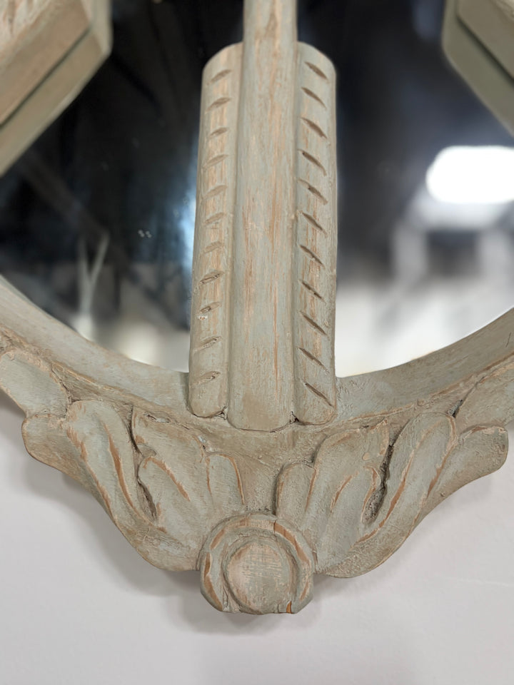 Pair of Oval White Carved Resin Wall Mirrors with Bow & Arrow Motif