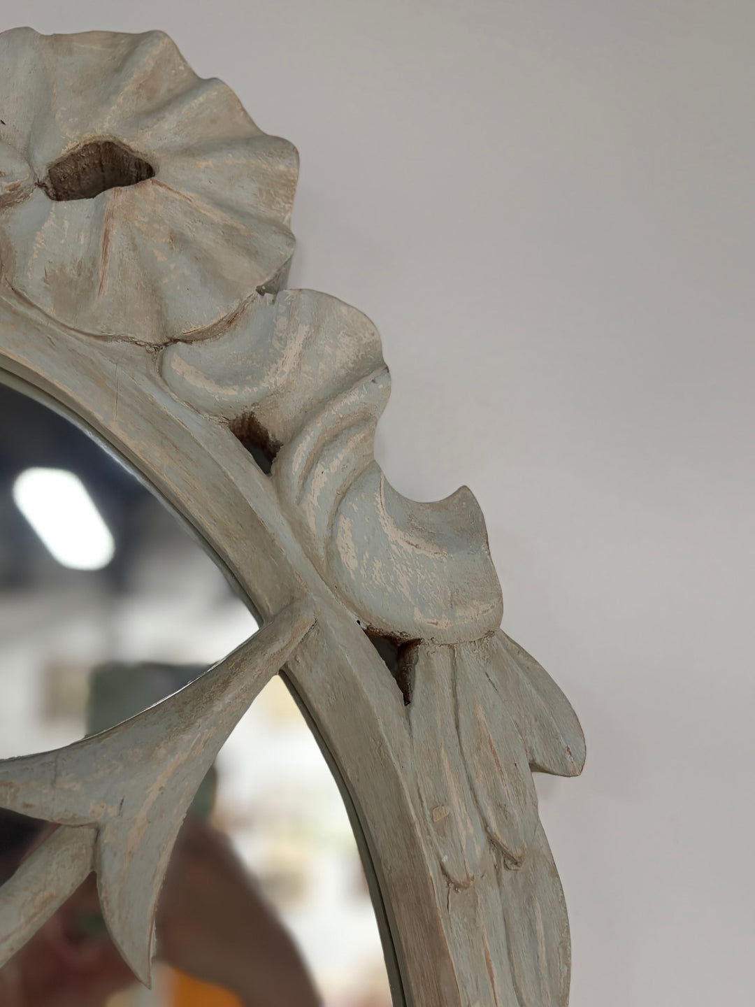 Pair of Oval White Carved Resin Wall Mirrors with Bow & Arrow Motif