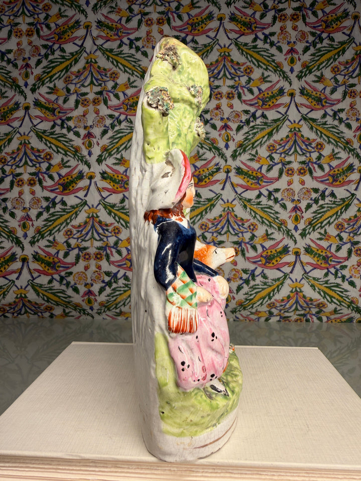 Staffordshire Pottery Figural Group with Two Children and Recumbent Deer