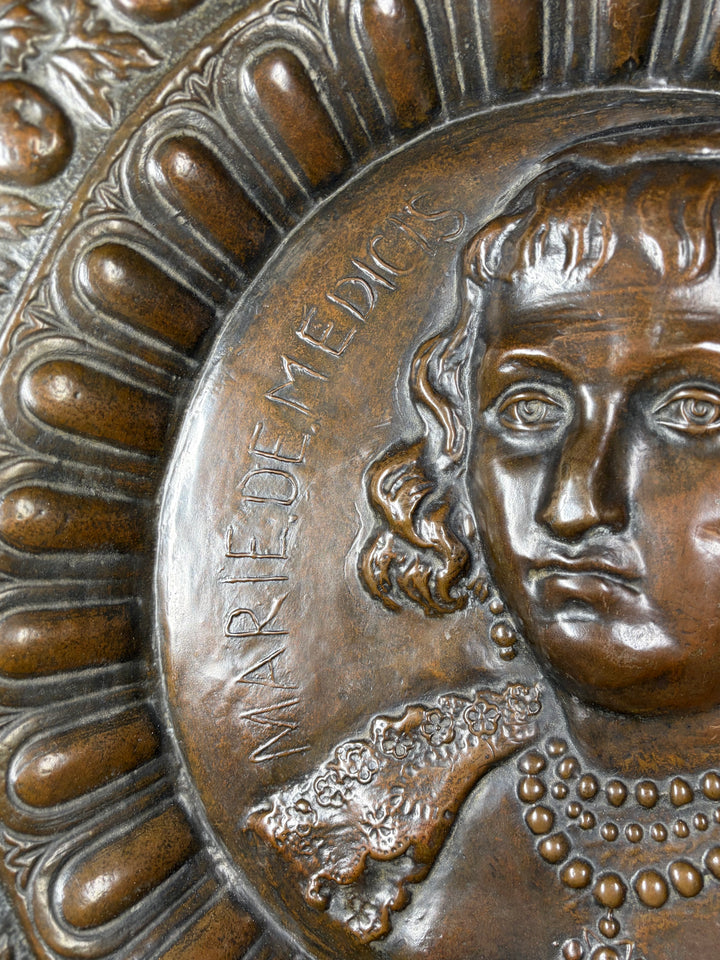Pair of Large Bronze Relief Chargers with Portrait Bust and Heraldic Decoration