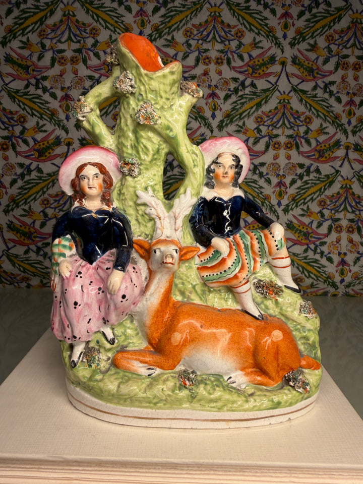 Staffordshire Pottery Figural Group with Two Children and Recumbent Deer
