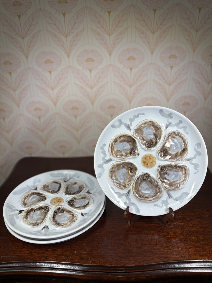 Set of Three Porcelain Oyster Plates