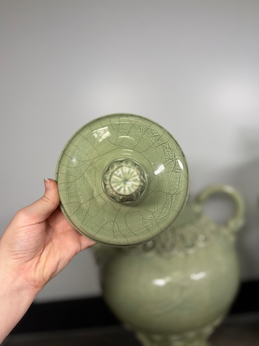Pair of Celadon Green Ceramic Lidded Urns with Handles