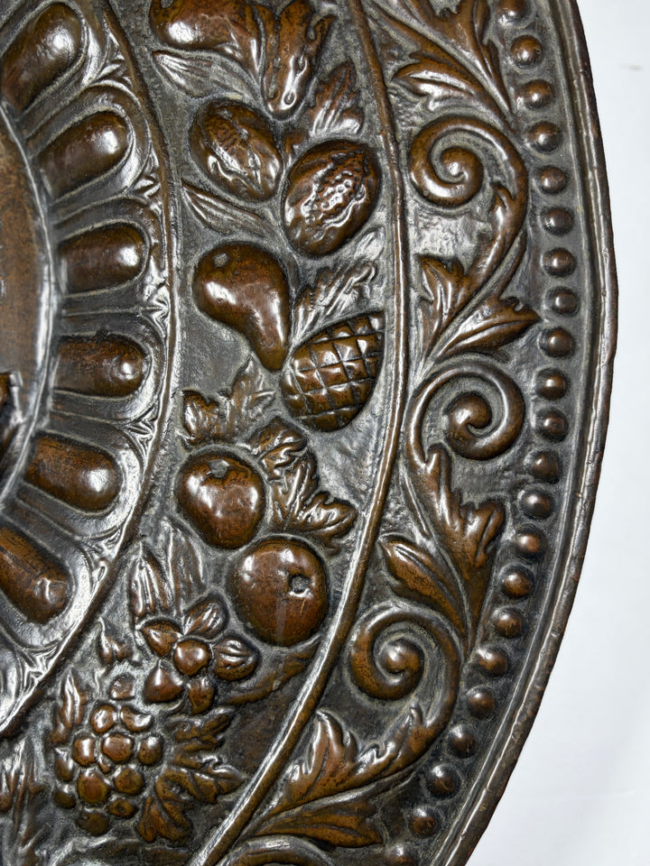 Pair of Large Bronze Relief Chargers with Portrait Bust and Heraldic Decoration
