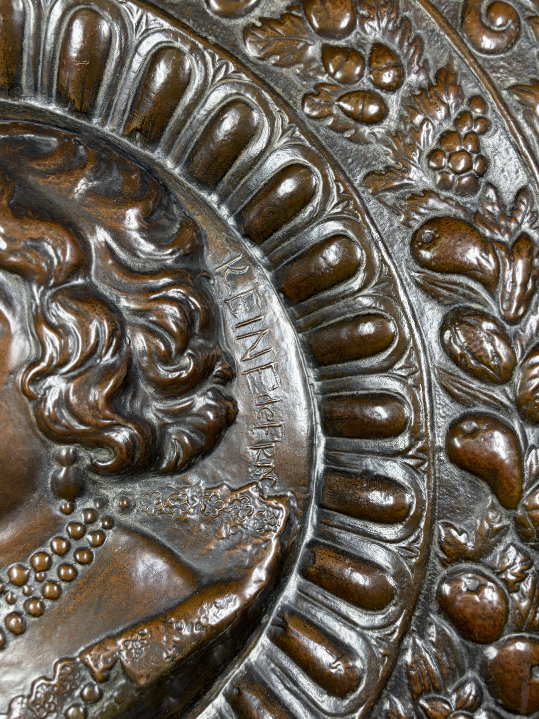 Pair of Large Bronze Relief Chargers with Portrait Bust and Heraldic Decoration