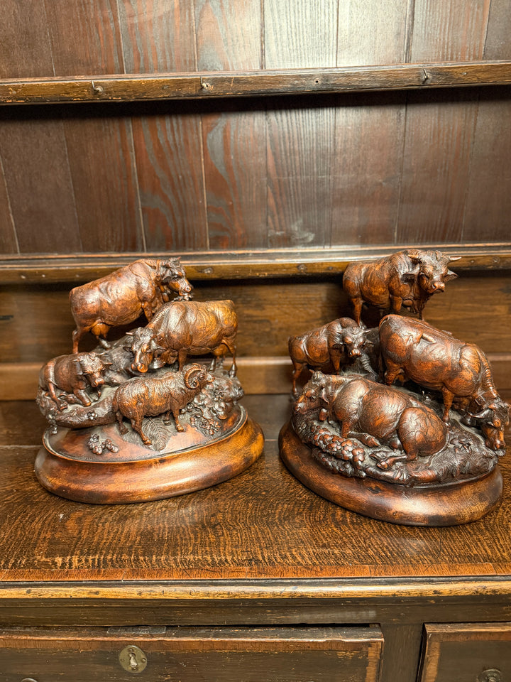 Pair of Black Forest Sculptures of Cattle Attributed to Johann Huggler of Brienz