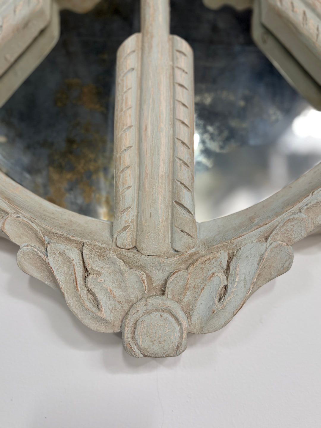 Pair of Oval White Carved Resin Wall Mirrors with Bow & Arrow Motif