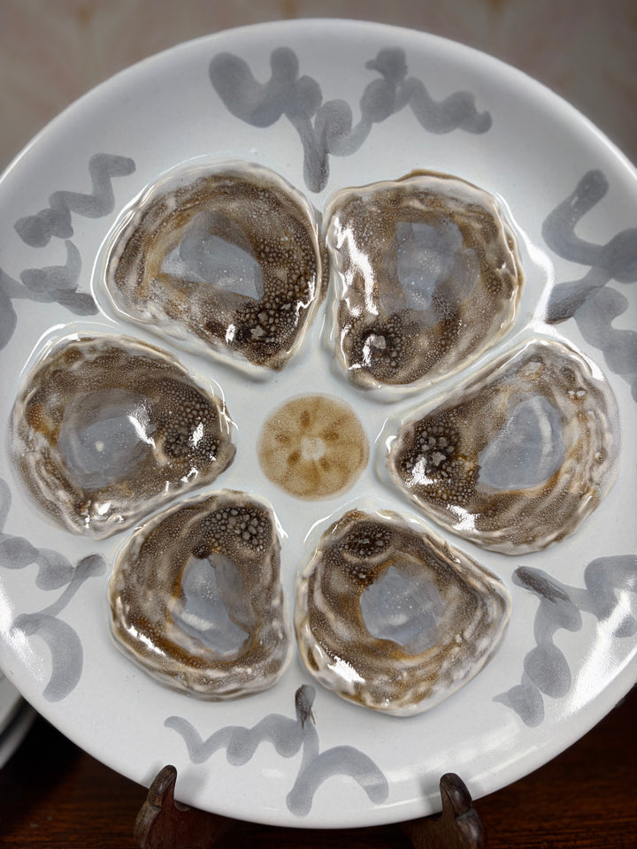 Set of Three Porcelain Oyster Plates