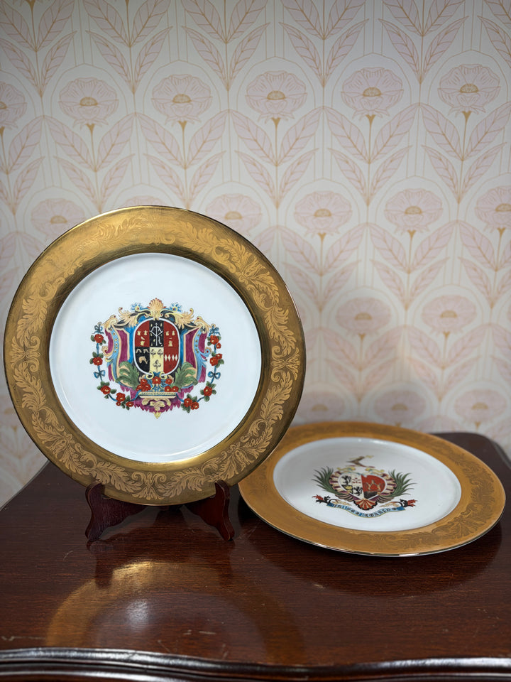 Pair of Decorative Armorial Porcelain Plates with Heavy Gold Borders