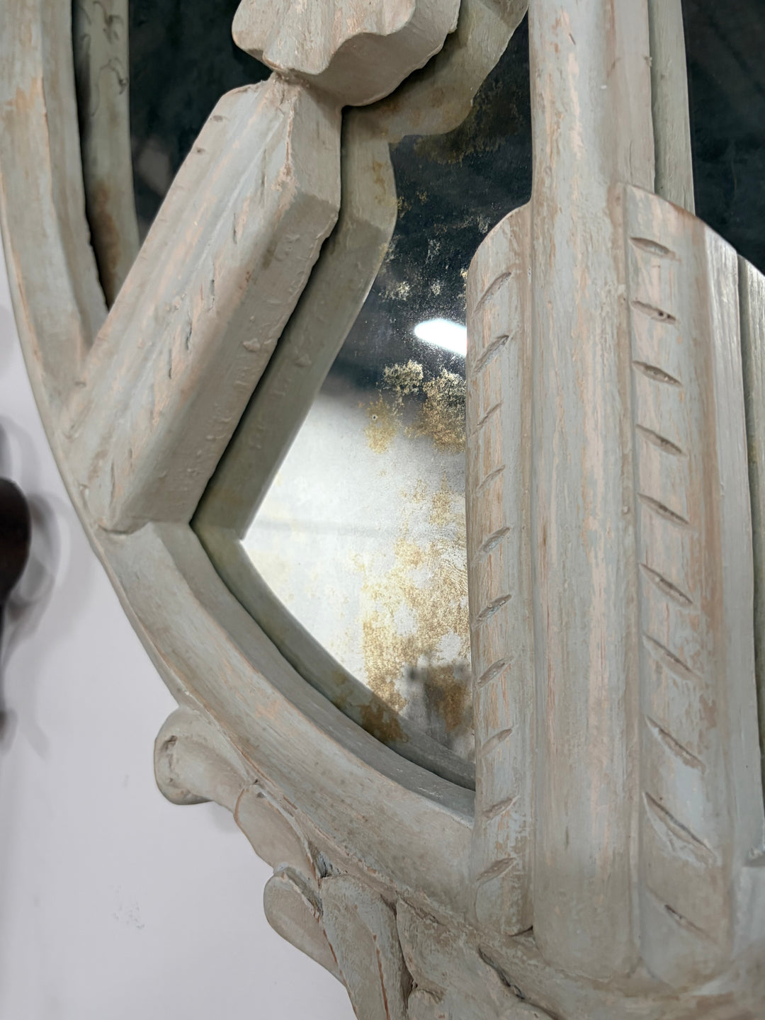 Pair of Oval White Carved Resin Wall Mirrors with Bow & Arrow Motif