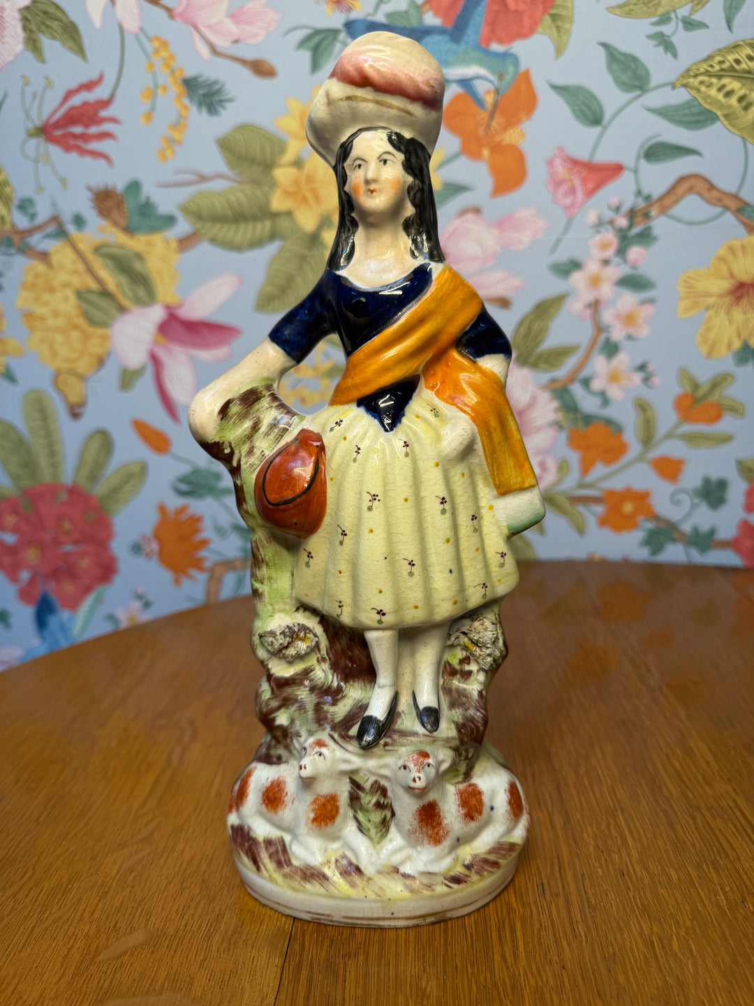 Woman and Two Orange Lambs