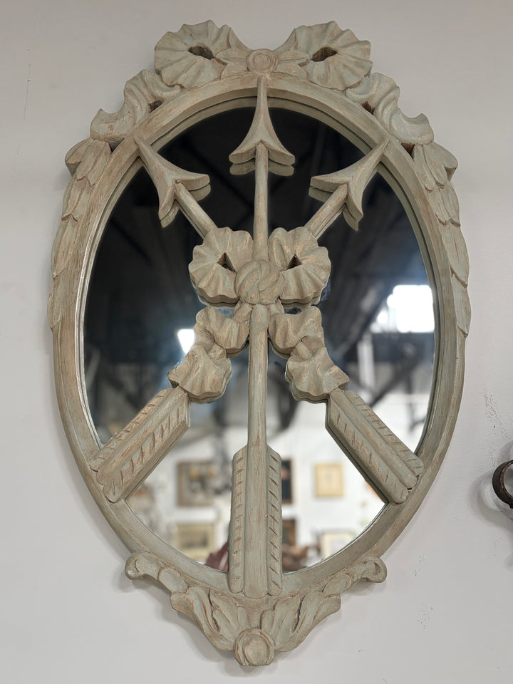 Pair of Oval White Carved Resin Wall Mirrors with Bow & Arrow Motif