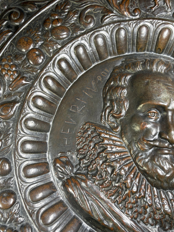 Pair of Large Bronze Relief Chargers with Portrait Bust and Heraldic Decoration