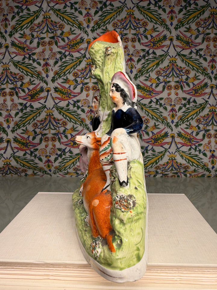 Staffordshire Pottery Figural Group with Two Children and Recumbent Deer