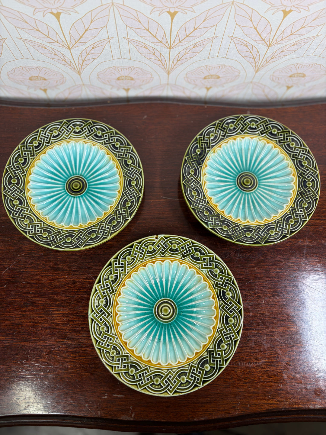 Set of Three Majolica-Style Ceramic Plates with Celtic Knotwork Border