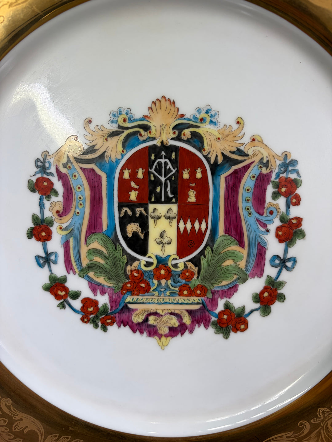 Pair of Decorative Armorial Porcelain Plates with Heavy Gold Borders