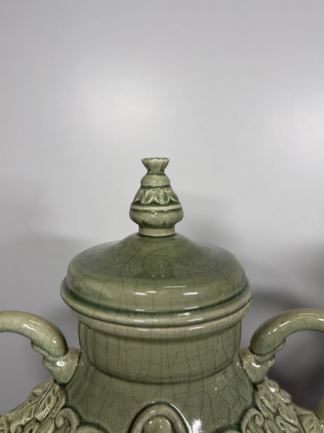 Pair of Celadon Green Ceramic Lidded Urns with Handles