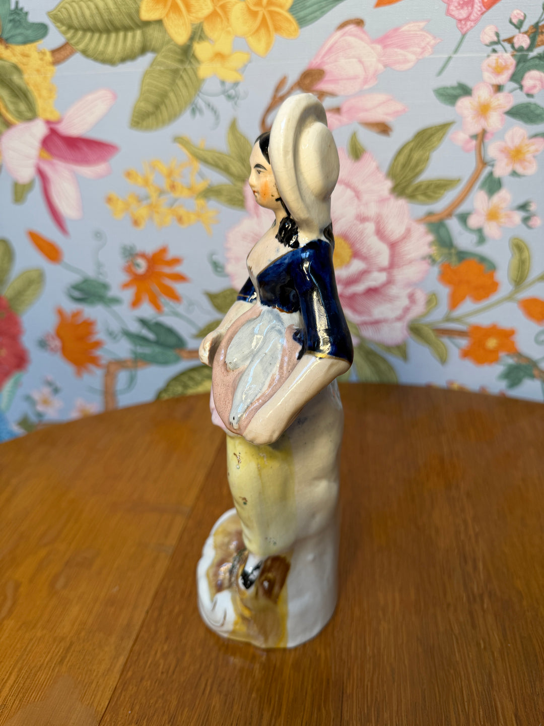 Antique Staffordshire Woman holding two fish