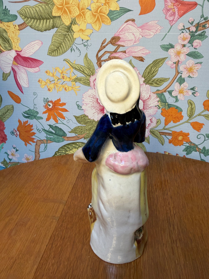 Antique Staffordshire Woman holding two fish