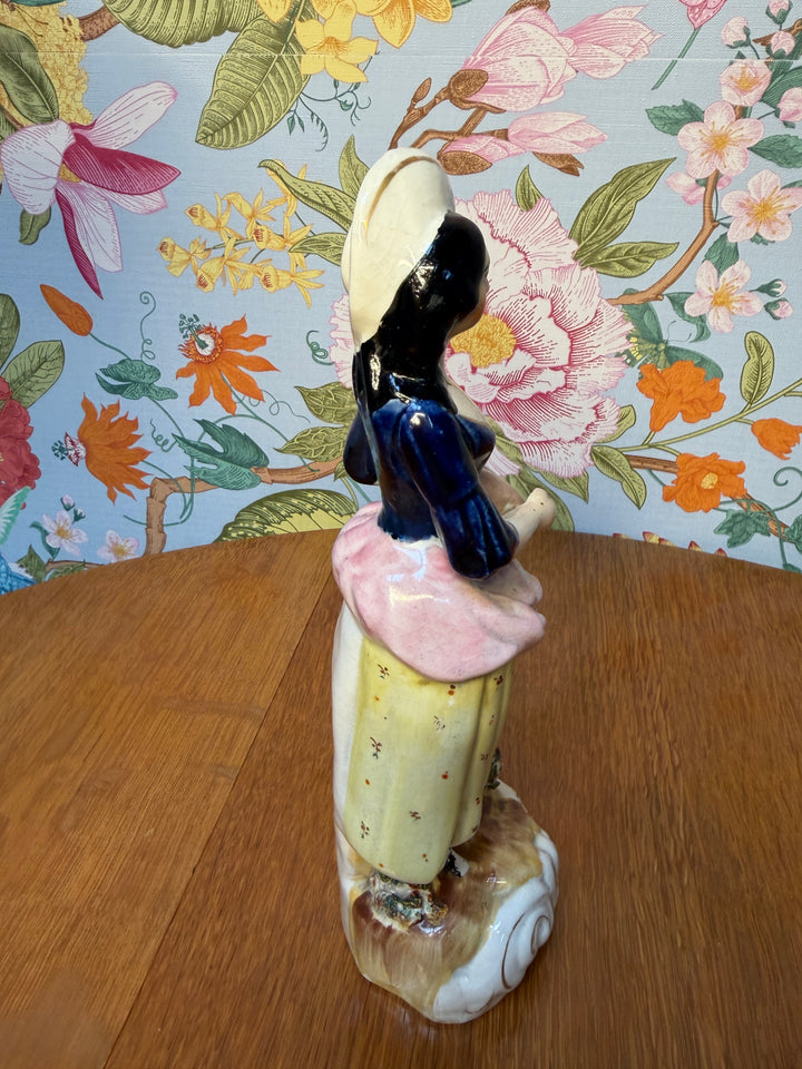 Antique Staffordshire Woman holding two fish