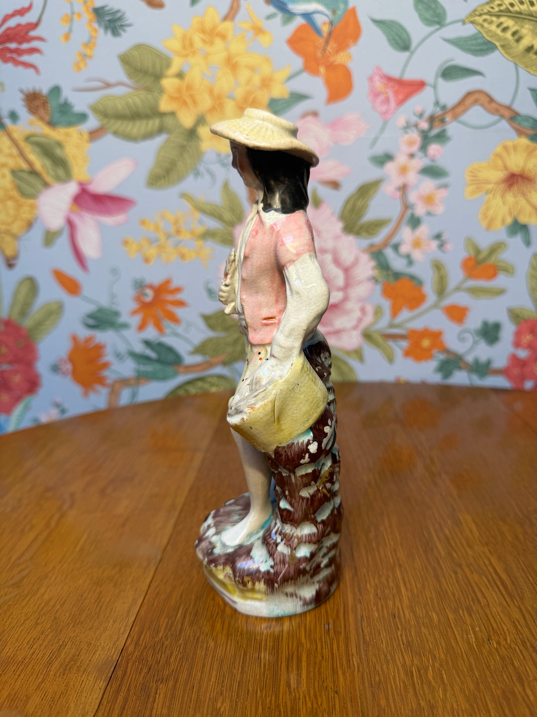 Antique Staffordshire Man with Fish Basket