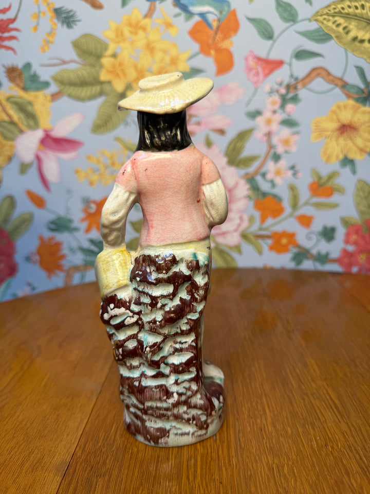Antique Staffordshire Man with Fish Basket
