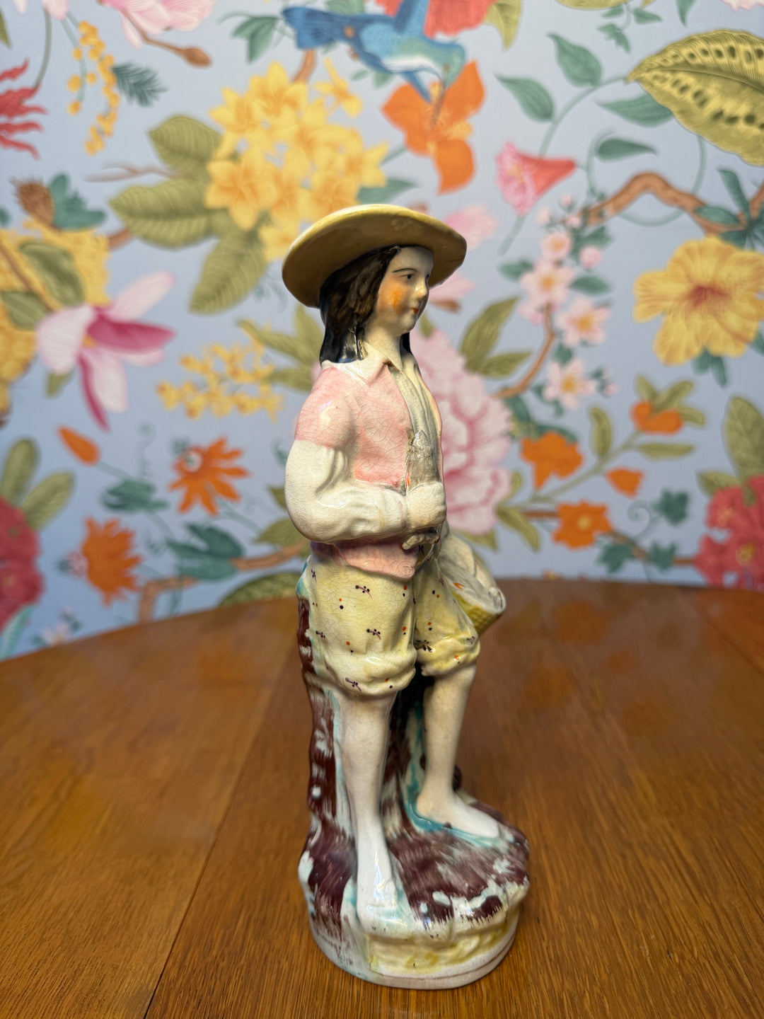 Antique Staffordshire Man with Fish Basket