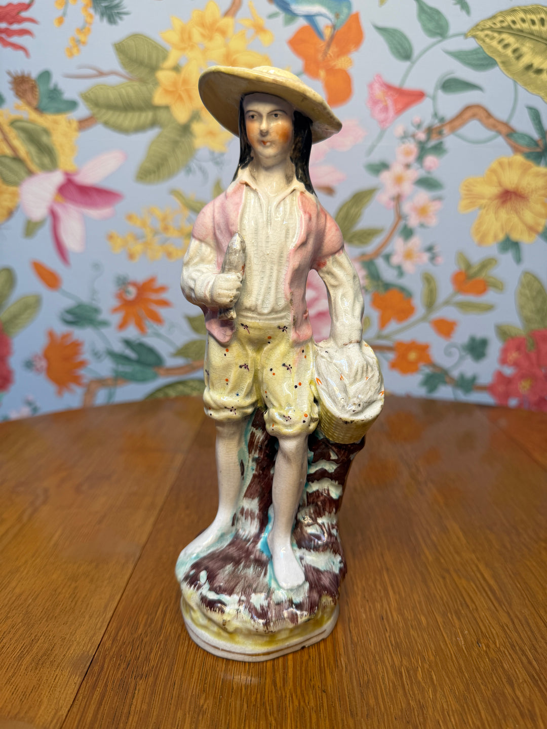 Antique Staffordshire Man with Fish Basket